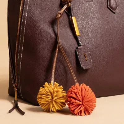 Chaveiro Pompons Soft Laranja E Amarelo
