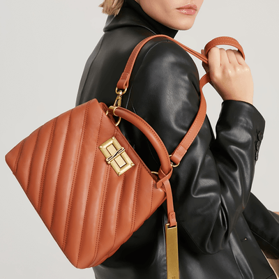 Bolsa Bucket Estruturada Matelassê Média com Alça Transversal de Couro Marrom - Linha Genuine Leather