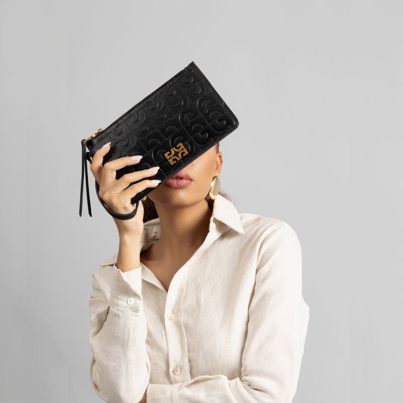 0975.519C.0038.0031_clutch_texturizada_preta_humanizada.jpg